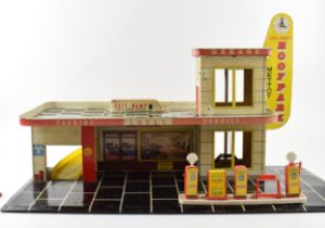 Vintage Toy Service Station garage by Mettoy. Tinplate garage with the Shell Oil company logo