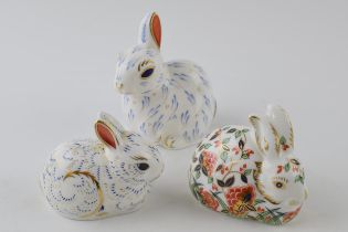 Three Royal Crown Derby paperweights, Snowy Rabbit, date code for 2002 (MII), 21st year special