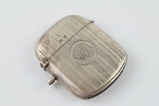 Hallmarked silver vesta case with engraved decoration, 17.1 grams, Birmingham 1912.