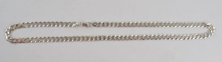 Silver curb link chain with lobster claw clasp marked 925 Italy. Length including clasp 61cm. Weight