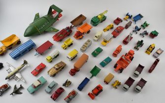 A collection of unboxed vintage die-cast model vehicles by manufacturers Dinky, Corgi and Matchbox