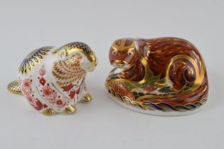 Two Royal Crown Derby paperweights, Otter, a gold signature edition specially commissioned by The