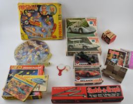 A collection of mainly boxed vintage toys dating from the 1960s and 1970s, to include Marx