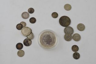 Silver coins to include a fine silver one ounce Britannia, 31.1 grams, pre-1920 coins to include