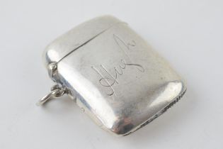 Hallmarked silver vesta case with engraved decoration, 'Hugh', 30.9 grams, Birmingham 1894.