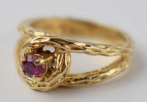 9ct gold dress ring set with red stone, 4.2 grams, size K/L.