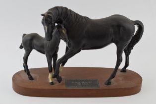 Beswick Black Beauty and Foal on wooden base. In good condition with no obvious damage or