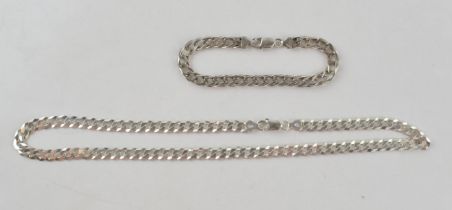 Silver curb link chain with lobster claw clasp marked 925 Italy. Length including clasp 51cm. Weight