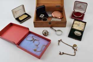 Jewellery to include a silver bangle, silver brooch, gold plated watch chain, silver handled