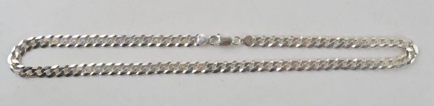 Silver curb link chain with lobster claw clasp marked 925 Italy. Length including clasp 51cm. Weight