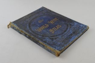 'The World Wide Atlas' by W & A K Johnston's Atlases, school atlas. Binding loose.