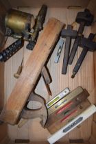A collection of vintage tools to include a blowtorch, planes, marking gauges and others.