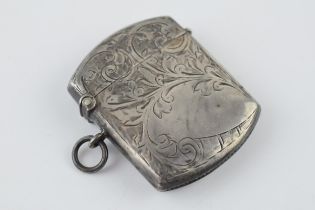 Hallmarked silver vesta case with engraved decoration, 23.4 grams, Birmingham 1912.