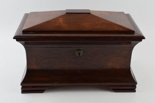 19th century rosewood tea caddy of sarcophagus form, with brass escutcheon, 37x22x23cm tall.