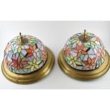 A pair of vintage liberty style stained glass celling mounted light fitings. Floral design with