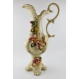 Large Capo Di Monte floral jug with relief floral decoration, 66cm tall. Generally good condition,