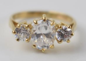 9ct gold three white stone dress ring, 2.5 grams, size K.