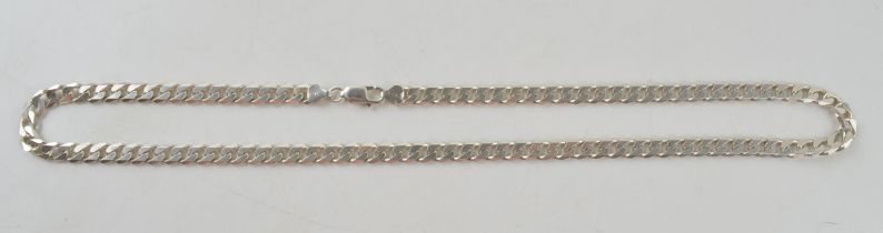 Silver curb link chain with lobster claw clasp marked 925 Italy. Length including clasp 61.5cm.