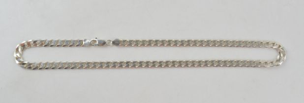 Silver curb link chain with lobster claw clasp marked 925 Italy. Length including clasp 52cm. Weight