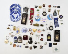 A good quantity of automobilia items to include car badges, keyring, pin badges, AA keys, (small