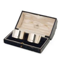 Cased pair of silver napkin rings, Chester 1931, CP & Co, 63.7 grams.