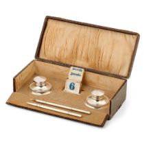 Cased silver writing set to include a perpetual calendar, Birmingham 1925, W Devenport, with