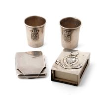 A collection of silver items to include cognac cups of WWI interest with Amiens crest, a William