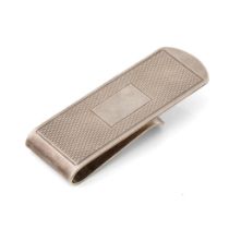 Silver money clip with engineered decoration, 17.2 grams.