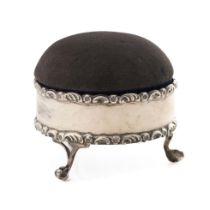 Silver jewellery / pin box, raised on 3 ball and claw feet, padded and raised top, Chester 1912, 7.