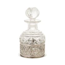 Silver and glass perfume bottle with silver base, Birmingham 1904, W Hutton, 12cm tall.