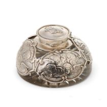 A late Victorian silver mounted glass inkwell, with Reynold's Angels design, William Comyns,