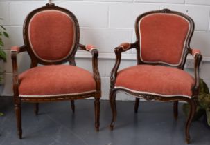 Pair of Edwardian 'His and Hers' English salon chairs. Upholstered in a good quality pink fabric.