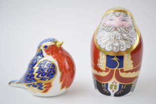 Two Royal Crown Derby paperweights, Santa Claus in the form of a Russian doll, 10cm high, red robe