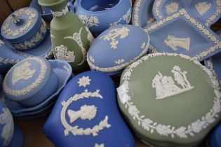 A collection of Wedgwood Jasperware to include vases, bud vases, lidded pots, trinket trays and