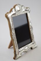 Hallmarked silver fronted photo frame with wooden easel back, London 2022, 21cm tall.