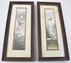 A pair of early 20th century Japanese prints of geese in flight, with red printed character marks (