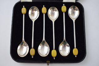 A set of 6 cased silver coffee bean spoons, Sheffield 1936, 54.7 grams.