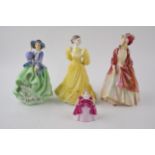 Royal Doulton figurines to include The Paisley Shawl HN1392, Top o'the Hill HN1833 in green