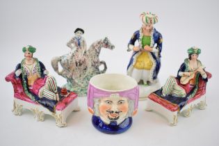 A collection of Staffordshire figures, circa 1840s-1860s, of Turkish figures to include a tobacco