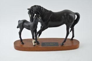 Beswick Black Beauty and Foal on wooden base, In good condition with no obvious damage or