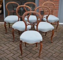 A matched set of 6 Victorian balloon back dining chairs with blue upholstery (6), 88cm tall. In good