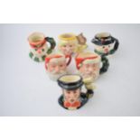 A trio of miniature Royal Doulton character jugs to include The Angel D7051, Santa Claus D6706,