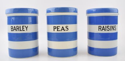 Three T. G Green storage jars with original lids, 'RASINS' 'BARLEY' and 'PEAS'. Height 17.5cm. In