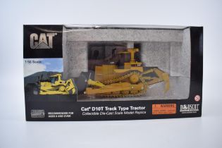 Boxed CAT D10T Track Type Tractor, 1:50 scale model, 1999. New in box, some marks to front of box,