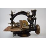 Willcox and Gibbs sewing machine, of New York, cast iron, 26cm long.