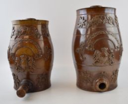 Two 19th stoneware water coolers / dispensers with crests in applied relief decoration. Height