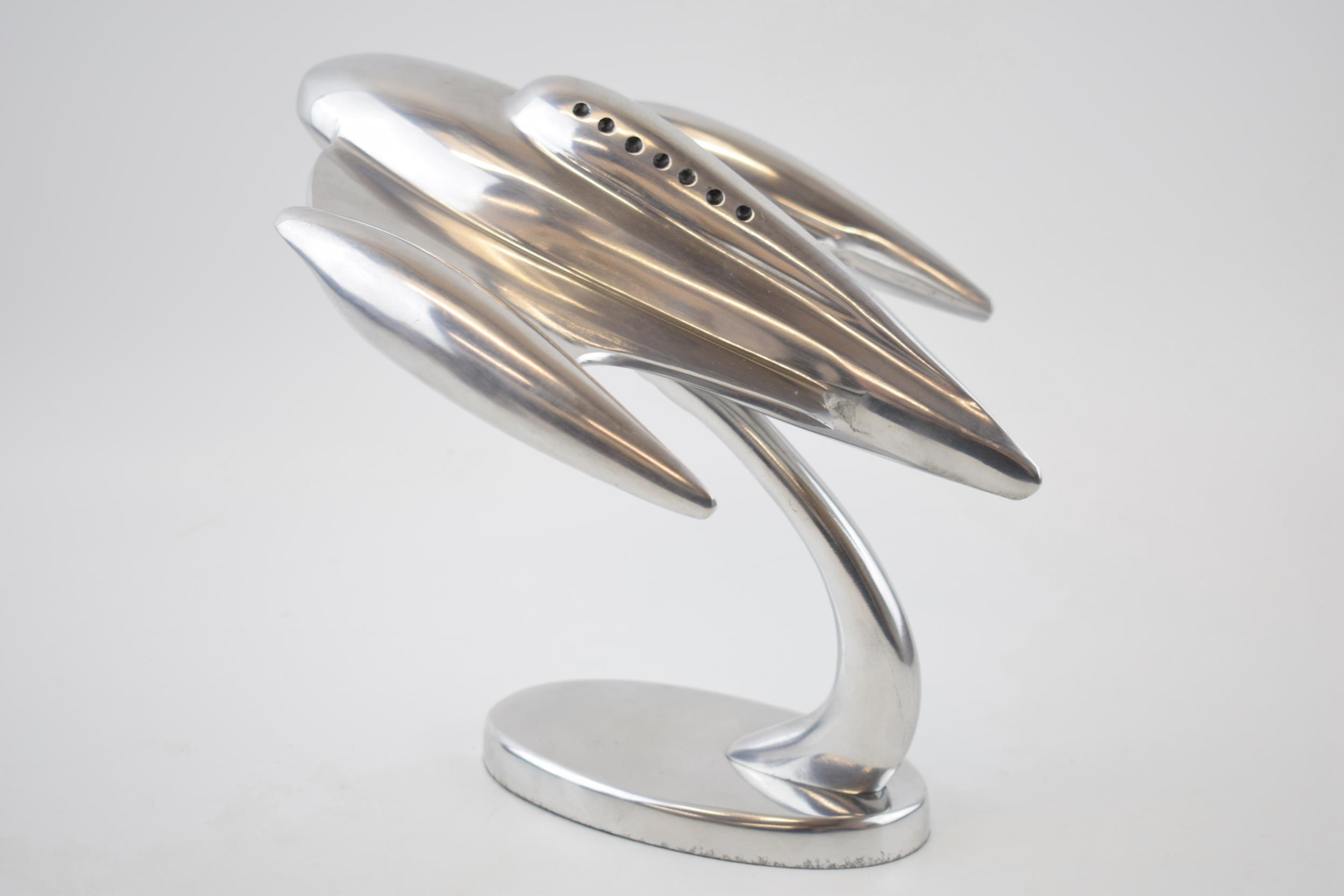 Modernist / vintage style figure of Flash Gordons comic book spaceship on a stand, nickel plated,