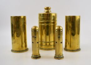 A collection of Trench Art brass items to include shell casings, primers and lidded pot made out