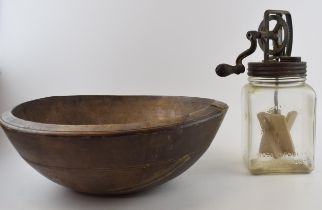 A vintage 'Blow Butter Churn 2/20' Made in England together with wooden miking bowl. In original