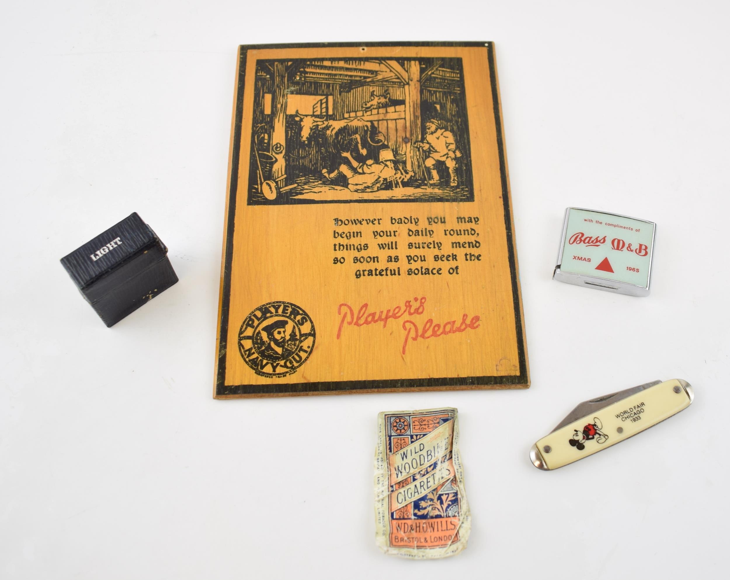 A collection of items to include 'Players Please' vintage shop / pub cigarette advertising on